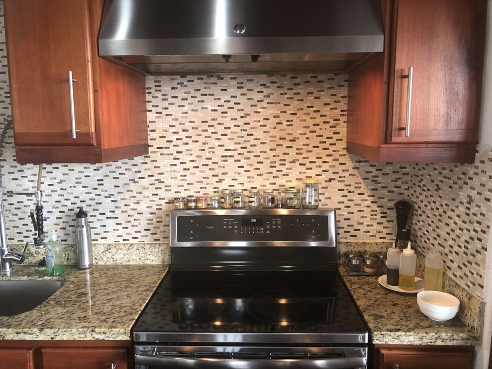 Modern G.E. Modern stove  with powerful  36 inch powerful extractor