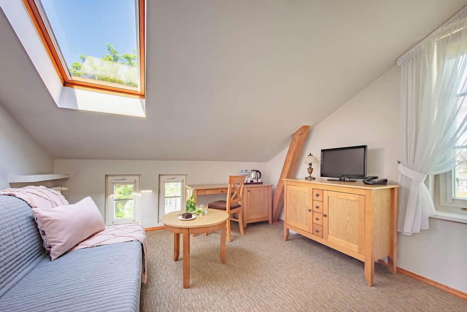 Family Room | Pillowtop beds, blackout drapes, iron/ironing board, free WiFi