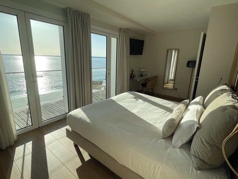 Superior Room, Balcony, Sea View | Minibar, in-room safe, desk, blackout drapes