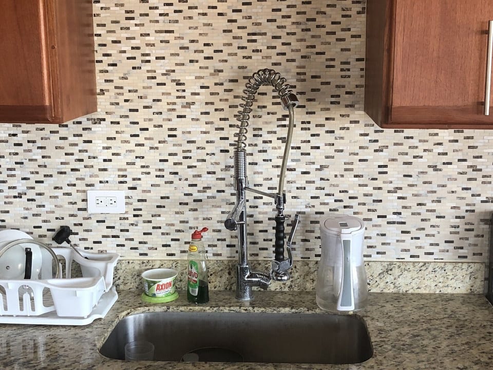 Deep sink with spray faucet option