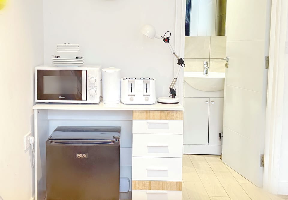 The Master Bedroom "Yellow Room" (ensuite),  with a brand new kitchenette 