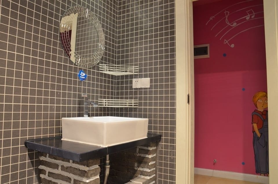Shower, free toiletries, hair dryer, slippers