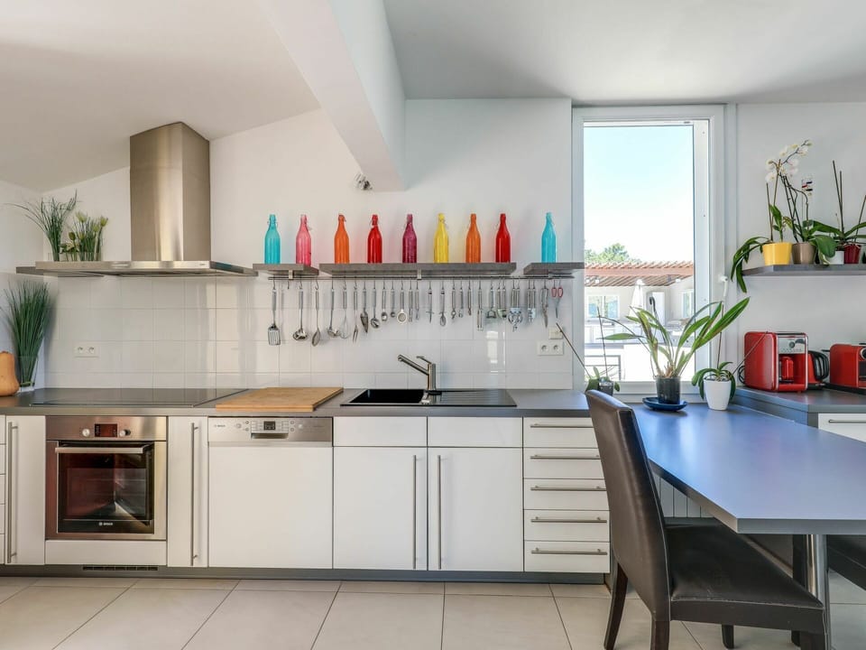 Cabinetry, Property, Countertop, Furniture, Bottle, Product, Plant, Kitchen, Wood, Houseplant