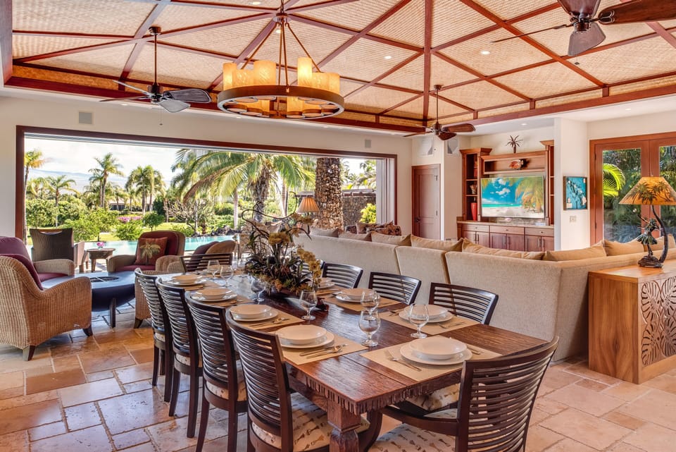 An elegant dining area with table for ten.