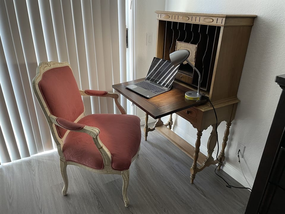 - Dedicated workspace with elegant chair and desk setup   - Bright natural light and calm environment perfect for remote work   - Designed for productivity and comfort during extended stays