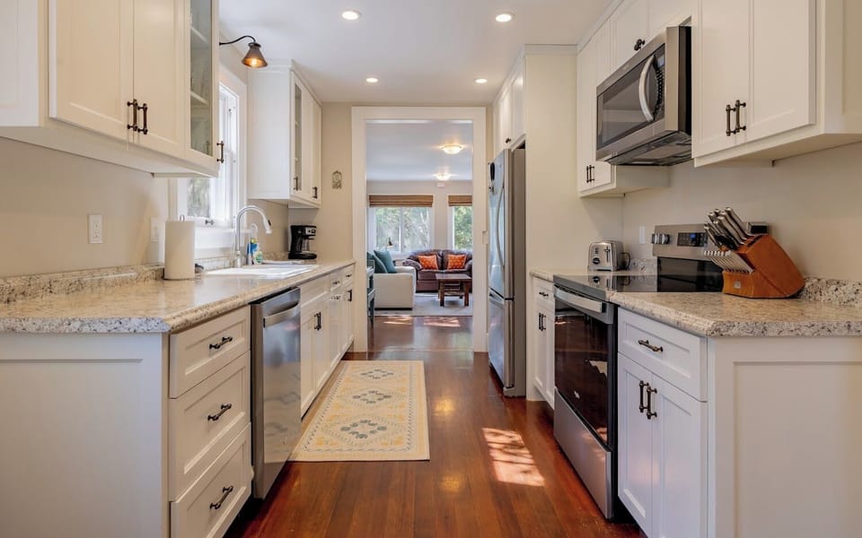 Galley style kitchen between living room and breakfast nook