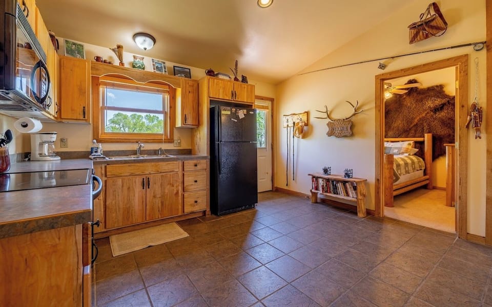 Spacious and bright kitchen with full size appliances.