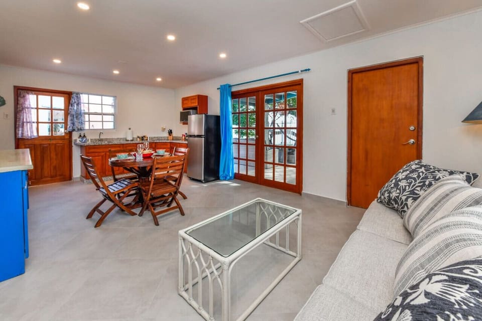 Experience ultimate relaxation in our bathroom featuring shower with water heater, comfy toilet and bath towels. Perfect for unwinding after a day explorer Aruba