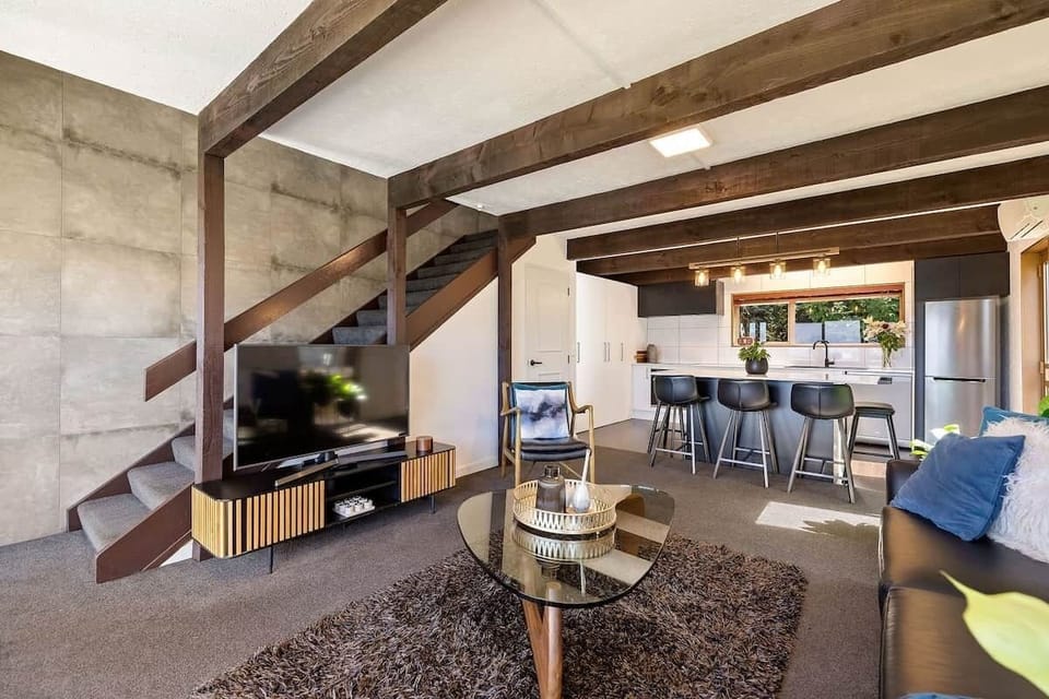 Dining area with mountain views at Walk to Town 39B Alpine Chalet Queenstown