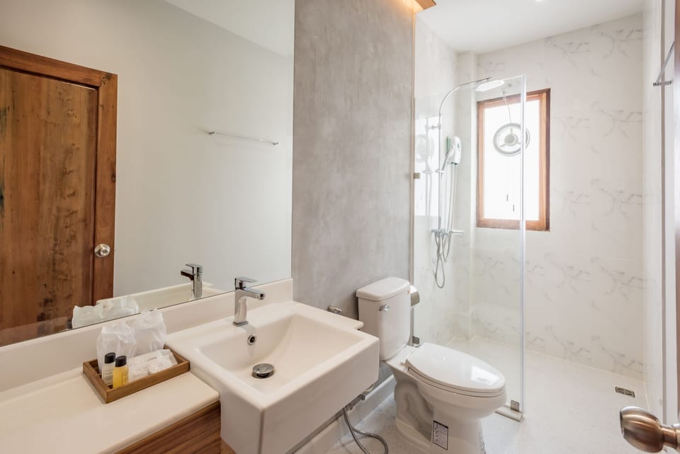 Shower, rainfall showerhead, towels