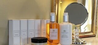 Phillips Suite | Bathroom amenities | Rainfall showerhead, designer toiletries, hair dryer, bathrobes