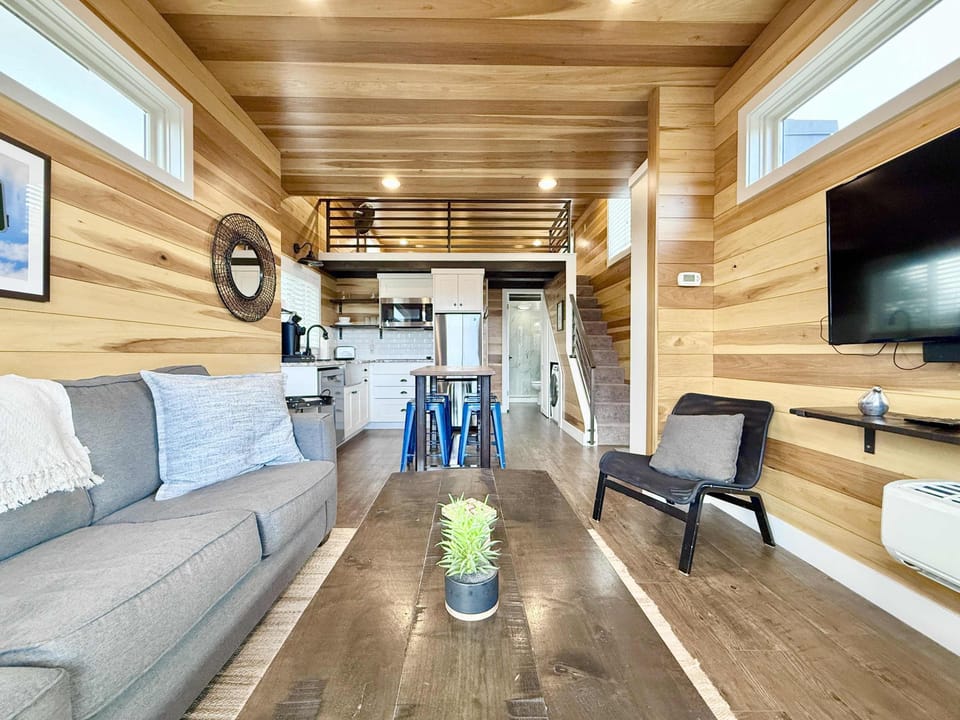The living room couch converts to a queen-size sleeper sofa. With the loft, master bedroom and sofa, you can sleep up to 6 at Desert Willow!