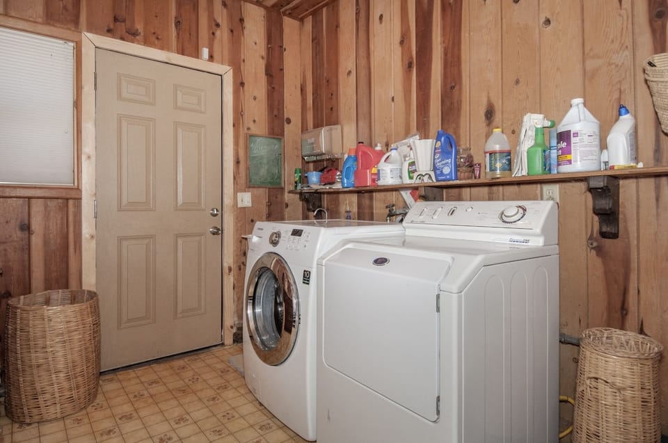 Laundry room and access to enclosed ocean facing view deck