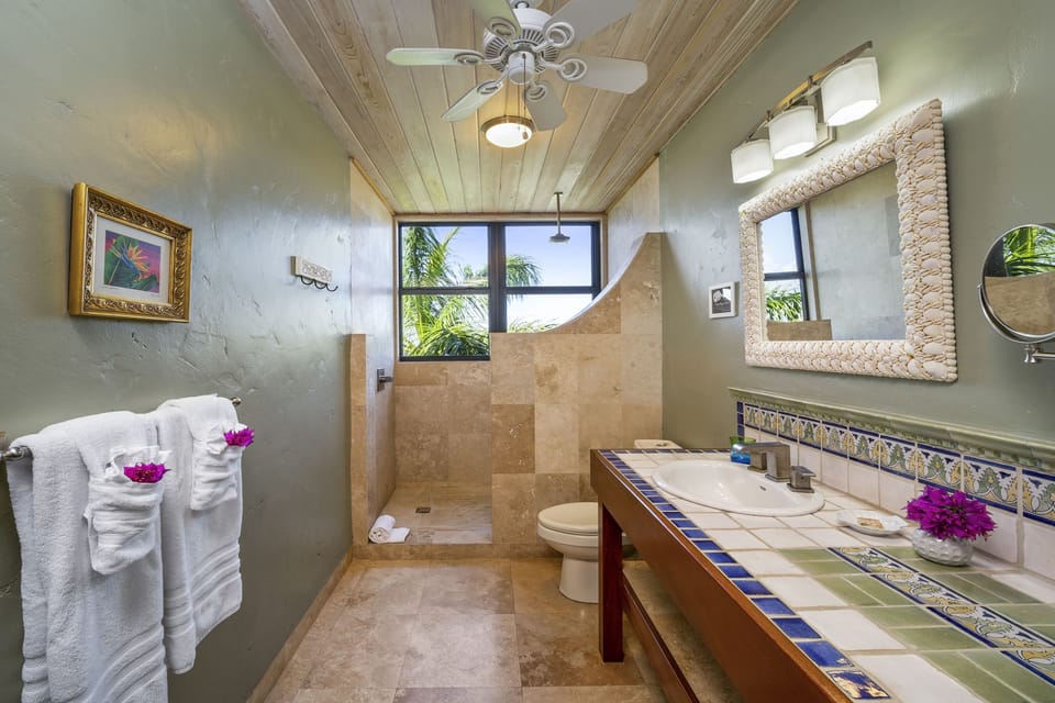 Main floor luxury bath with ocean view shower.