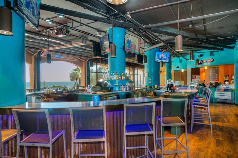 Enjoy a drink at the bar with the ocean in site.