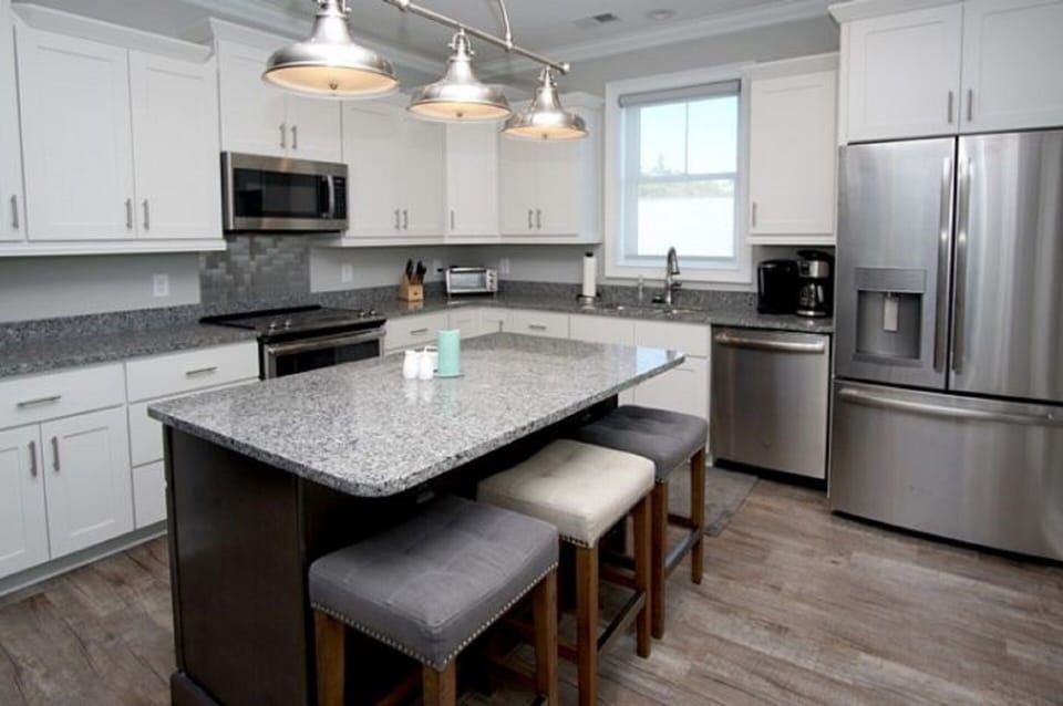 Grab a snack at the kitchen bar before heading back to the beach. 