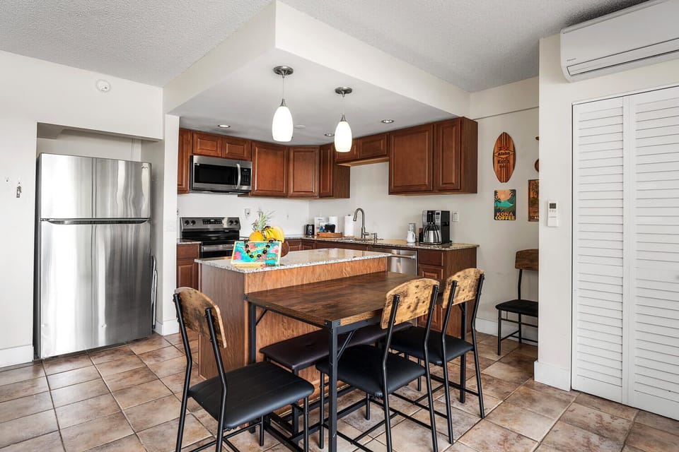 Your fully-equipped kitchen invites culinary adventures with granite countertops, stainless steel appliances, and a cozy dining nook for memorable meals together.