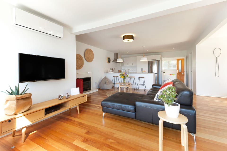 Premium House, Multiple Beds, Partial Ocean View | Living area | Flat-screen TV