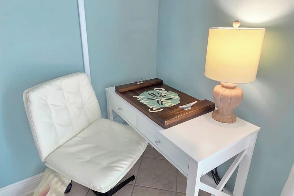 Plug in and stay connected — the dedicated master suite desk has USB ports and outlets so working remote does not mean working without.