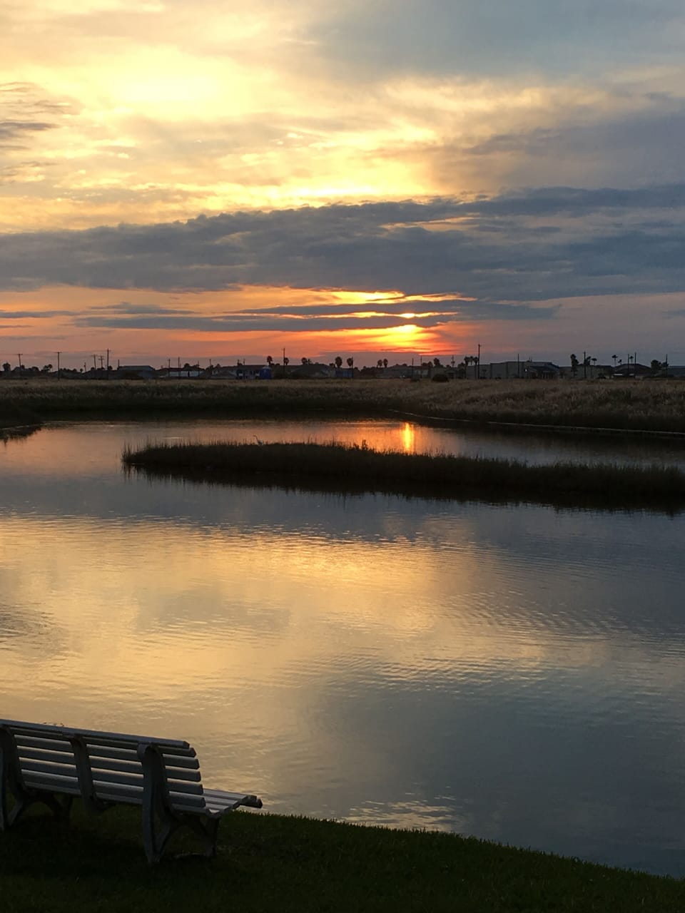 Sunset over salt water pond