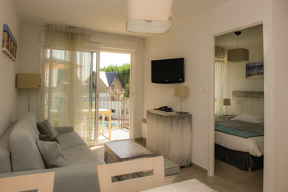 Welcome to our bright and cozy apartment by the beach.