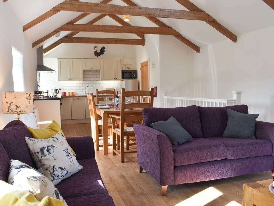 Comfortable sofas in the living area | Bull Pen - Morwenna Barns, Mount Hawke, near St Agnes