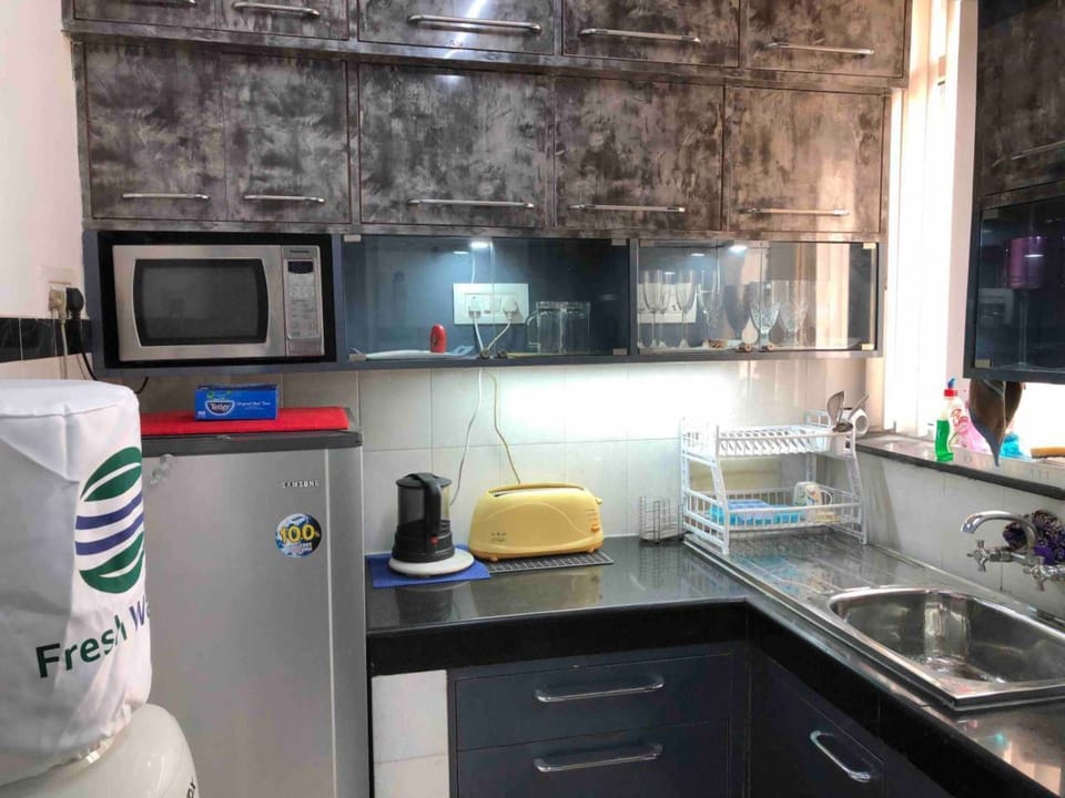 Apartment | Private kitchen | Fridge, microwave, oven, stovetop