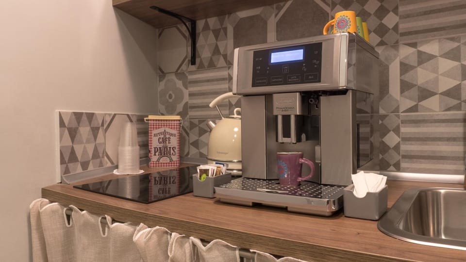 Mini-fridge, microwave, stovetop, espresso maker