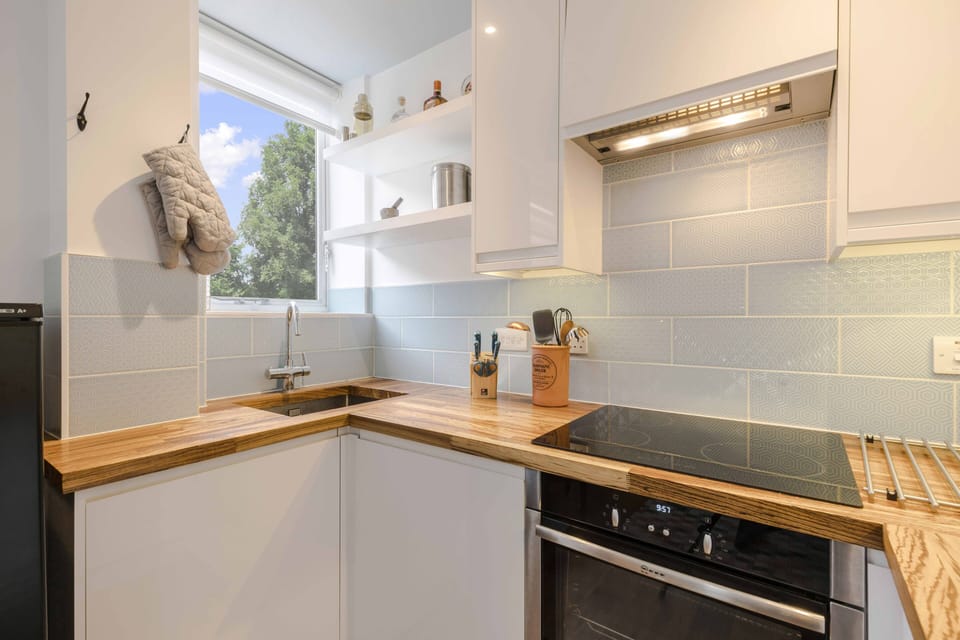 Kitchen is fully equipped with microwave, fridge/ freezer, induction hob. 