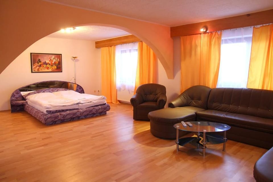 Superior Apartment, Multiple Beds | Living room | Flat-screen TV
