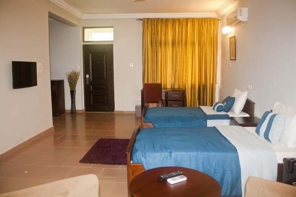 Deluxe Double or Twin Room | In-room safe, desk, laptop workspace, iron/ironing board (on request)