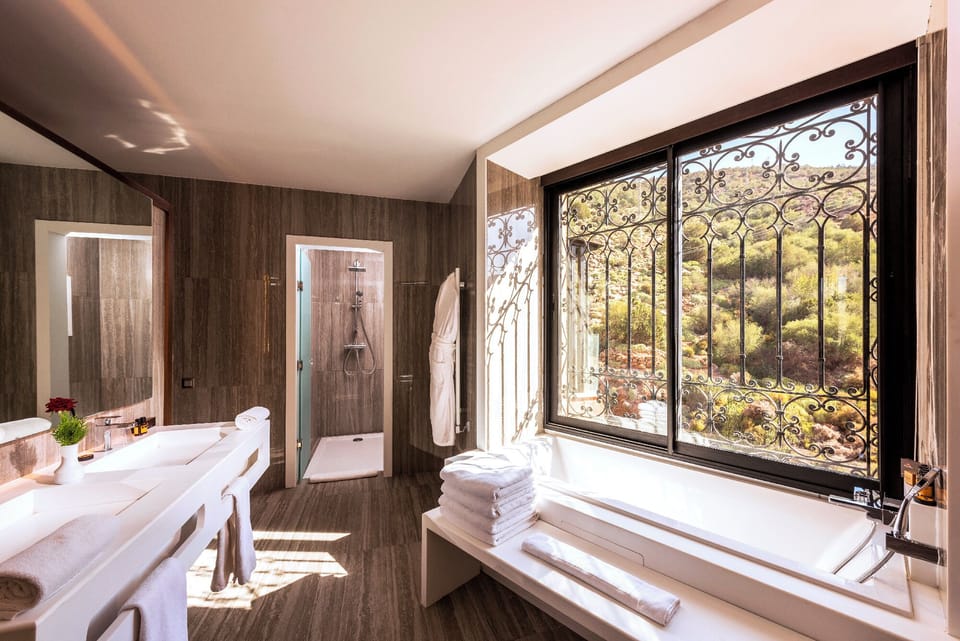 Senior Suite, 1 Bedroom, Lake View | Bathroom | Shower, hair dryer, bathrobes, slippers