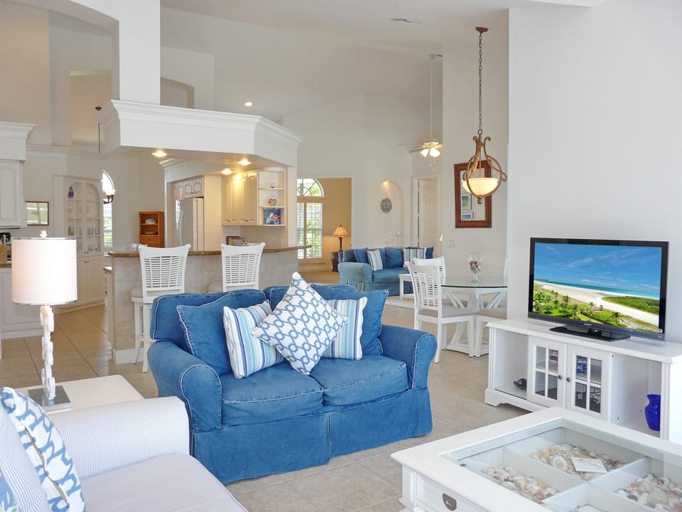 House, Multiple Beds (Relaxing waterfront home with pool an) | Living area | Flat-screen TV