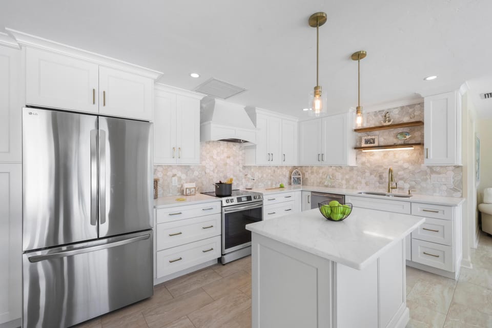 House, 1 King Bed with Sofa bed (Inviting waterfront home with western) | Private kitchen | Fridge, microwave, oven, stovetop