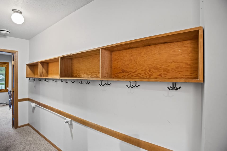 Coat hooks and gear storage