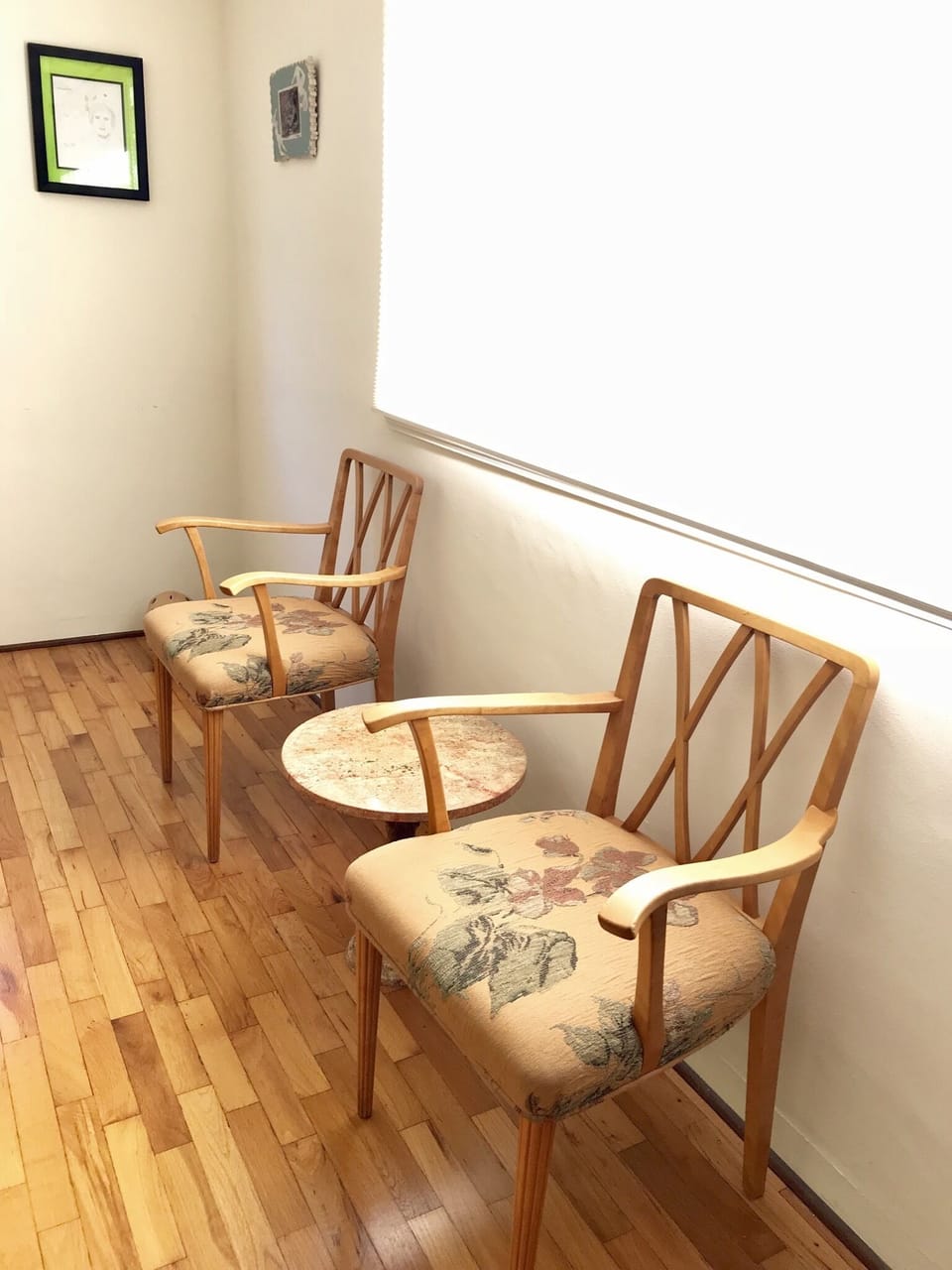 Chairs in master bedroom with custom upholstery and hand painted table
