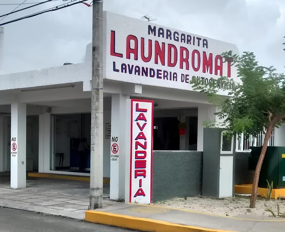 The Laundromat is right around the corner.