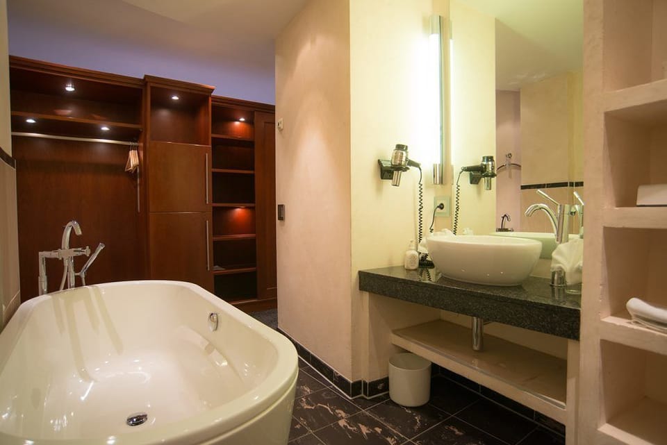 Hair dryer, slippers, towels, soap