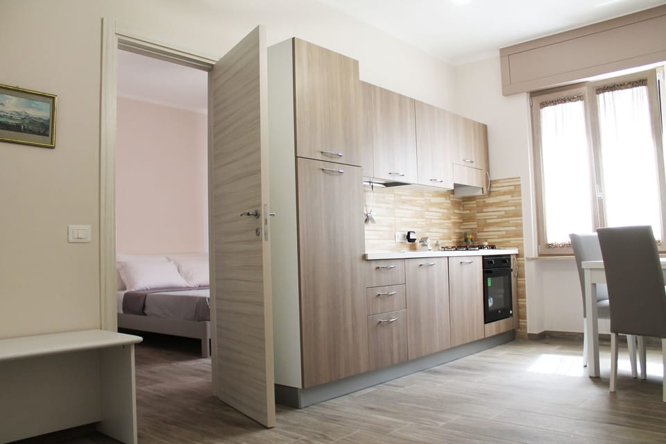 Superior Quadruple Room, Ensuite, Courtyard View | Private kitchen