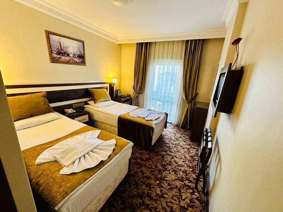 Standard Double or Twin Room, City View | 1 bedroom, in-room safe, free WiFi, bed sheets