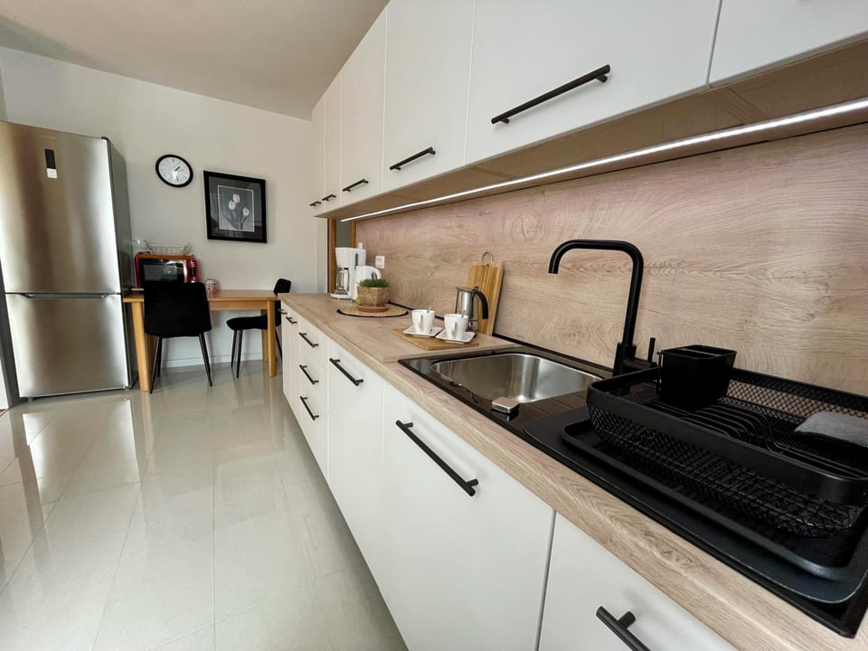 Apartment, 2 Bedrooms, Balcony | Private kitchen | Fridge, microwave, oven, stovetop