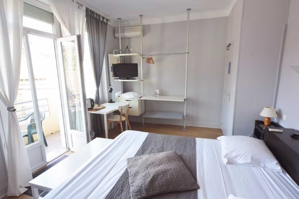 Triple Room | Desk, blackout drapes, iron/ironing board (on request), cribs (free)