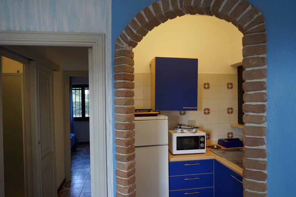 Apartment, 2 Bedrooms | Private kitchen | Fridge, microwave, oven, stovetop