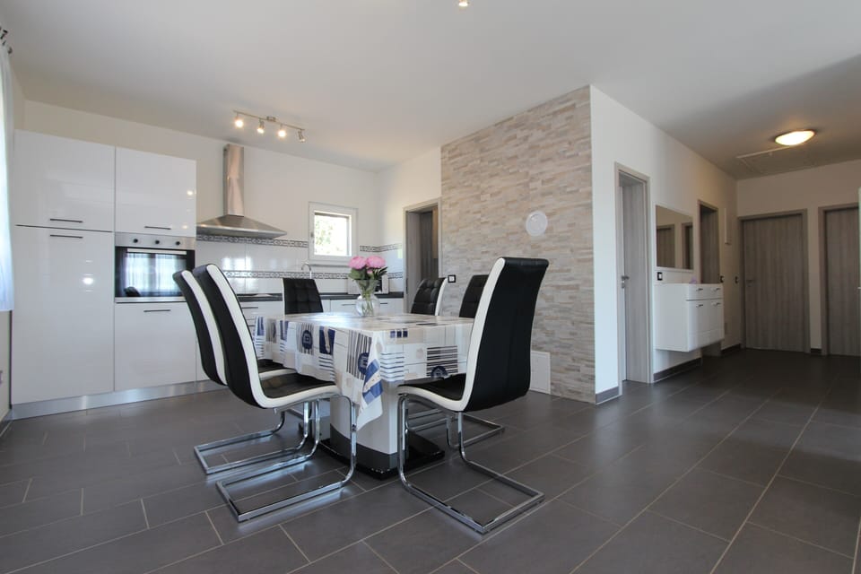 Apartment, 3 Bedrooms | Private kitchen | Coffee/tea maker, full-size fridge, microwave, oven