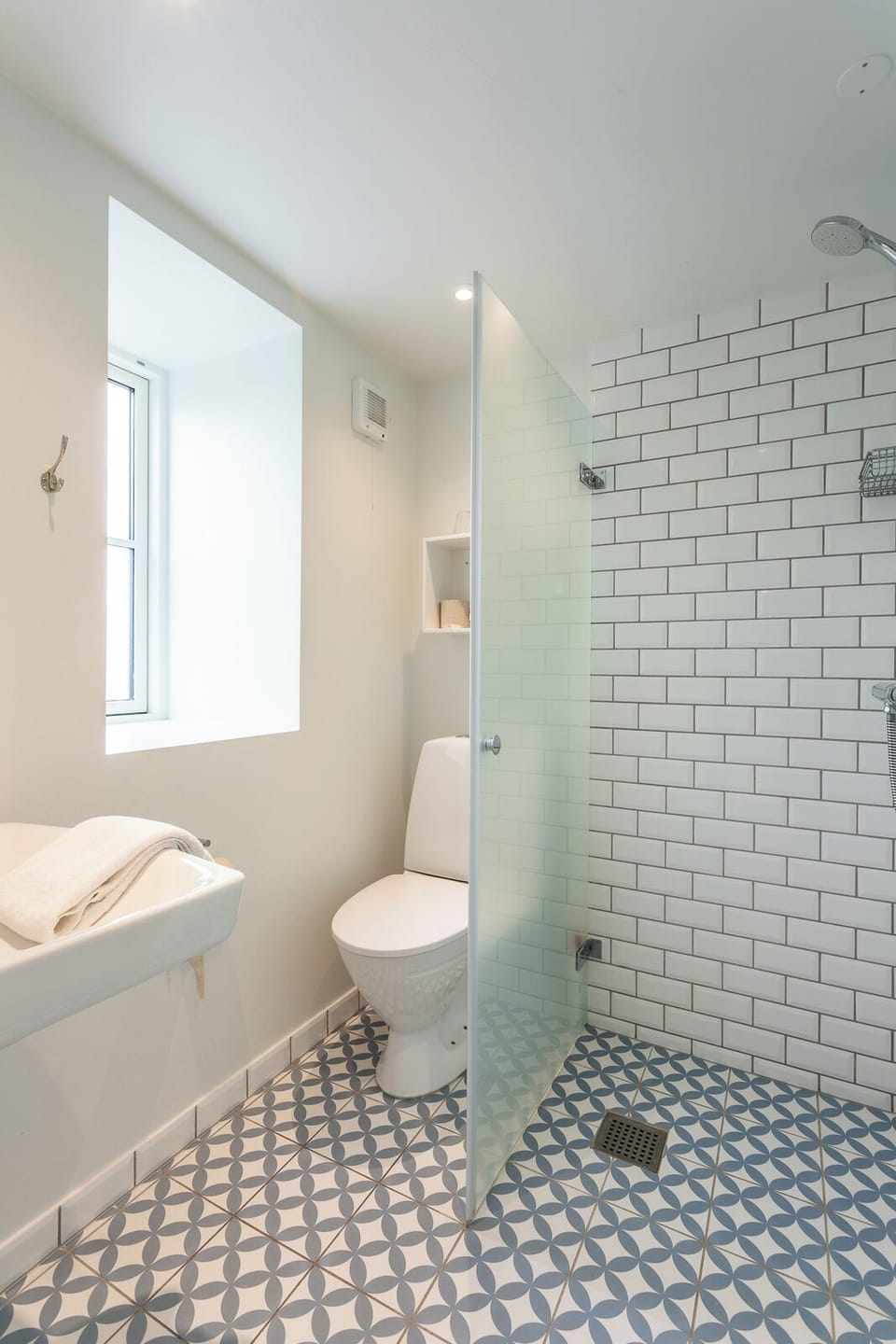 Eco-friendly toiletries, hair dryer, slippers, towels