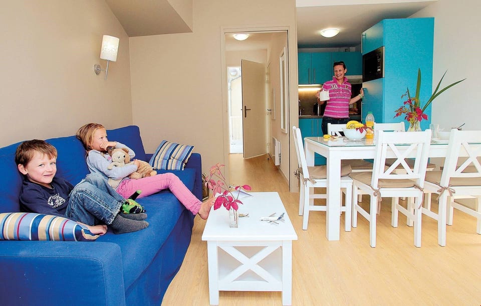 Prepare meals in the kitchenette and enjoy them at the dining table.