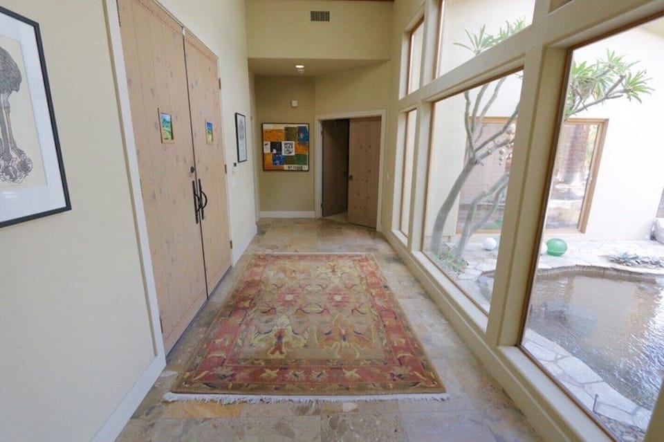 Front door and hallway to Master and Guest Bedroom 1