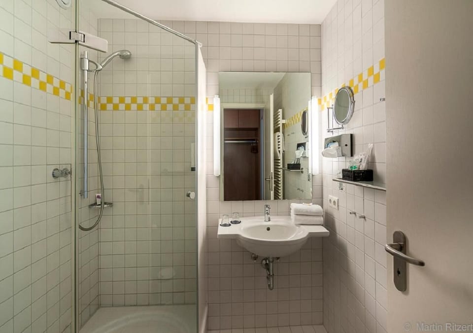 Shower, eco-friendly toiletries, hair dryer, towels