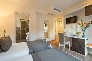 Premium bedding, down comforters, minibar, in-room safe