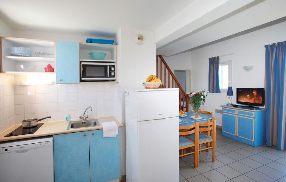 The kitchenette comes equipped for your convenience.